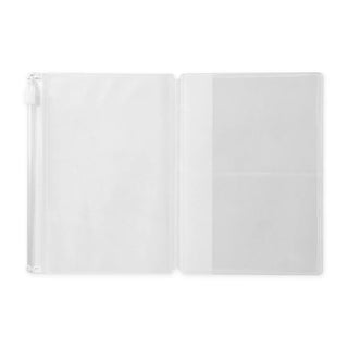 White passport zipper case opened, showing clear inner pocket panels.