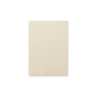 Passport-size notebook, blank beige cover with textured paper surface