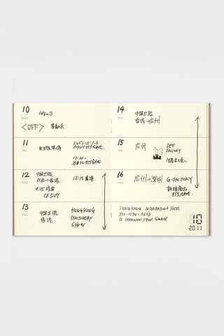 Open weekly planner pages with handwritten notes and numbered dates