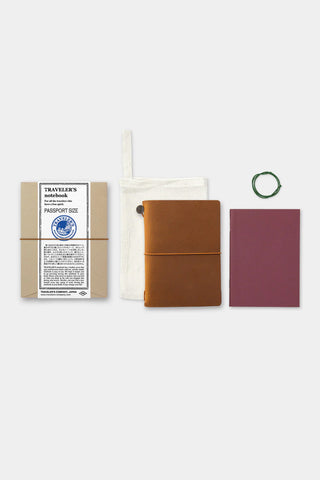 Leather notebook set with cotton bag, spare rubber band, and notebook cover components