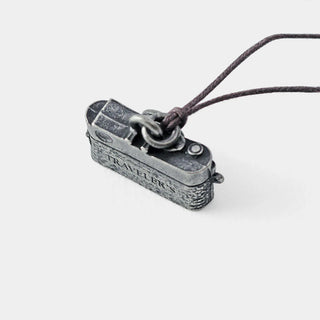 Pewter camera charm pendant with dark cord, back view with engraving
