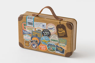 Kraft brown Traveler's notebook 20th anniversary case with handle and anniversary graphics