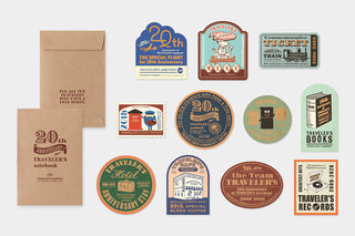 Kraft notebook sleeve plus multiple anniversary sticker badges and label cards