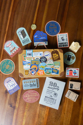 Traveler's notebook 20th anniversary customization set with colorful stickers and tags