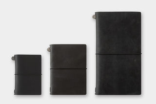 Three dark notebook card-size covers with elastic closure