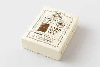 Card size set packaging box for brown leather travel notebook, sealed.
