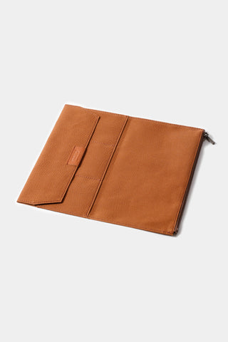 Brown cotton zipper case laid flat with internal divider panel