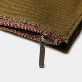 Olive zipper case close-up, stitched edge with YKK metal zipper pull and zipper track