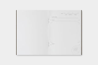 Passport-sized stamp refill insert with blank layout and faint circular stamp guide