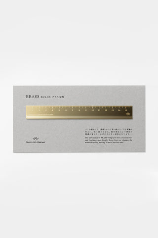 Brass metric ruler with engraved millimeter scale and 'TRC' logo