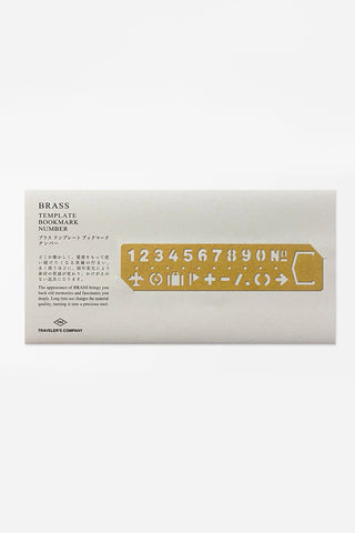 Brass bookmark number template sheet with alphabet, digits 1–0, and symbol cutouts
