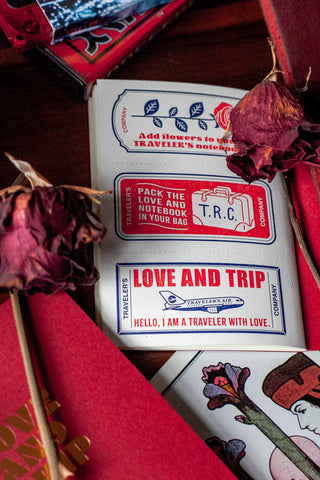 Red "Love and Trip" passport refill cards with T.R.C. label and small traveler notes