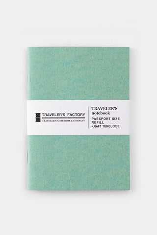 Turquoise kraft passport-size notebook cover with Traveler's Factory label