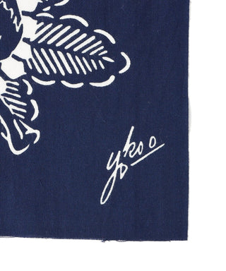 Dark blue tenugui towel close-up with white signature-style mark