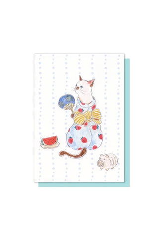 Summer pop-up greeting card with white cat holding a seashell and watermelon slice