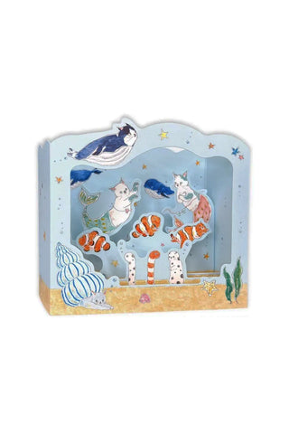 Pop-up aquarium greeting card, arch-shaped front with cats, clownfish, and coral shells.