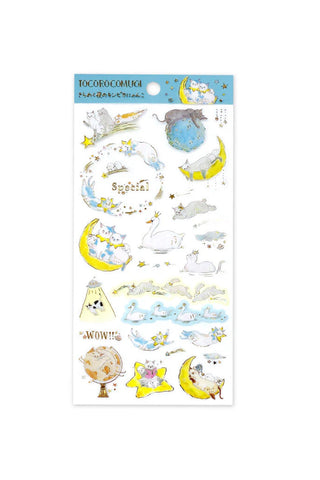 Sparkling celestial sticker sheet with moons, stars, planets, and gold foil accents