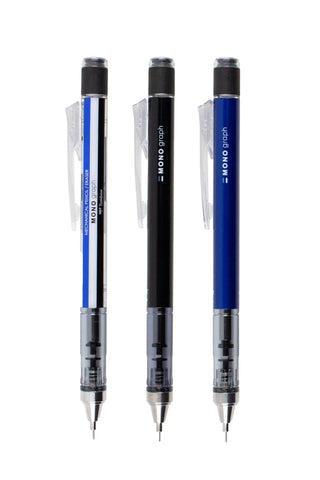 Three Tombow MONO Graph mechanical pencils: black, white-silver, and blue bodies.