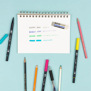 Beige Tombow MONO sand and rubber eraser with blue label on art supplies