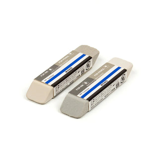 Two beige Tombow MONO sand and rubber erasers in boxes with blue stripe