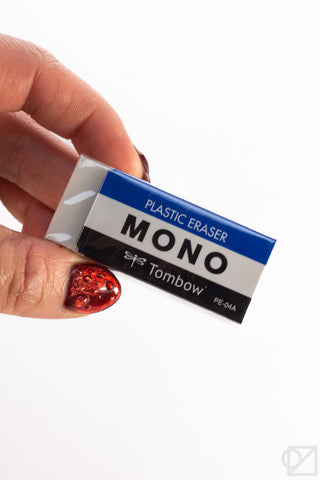 Tombow MONO medium plastic eraser block, held in hand