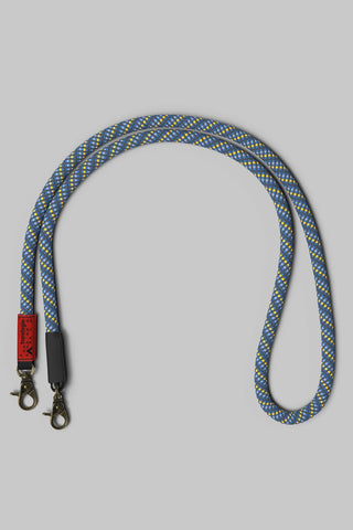 Topologie rope strap, blue-and-yellow starry pattern, metal clips and black end hardware