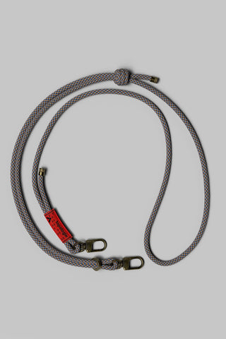 Rope strap in blue-orange lattice weave with metal snap clips