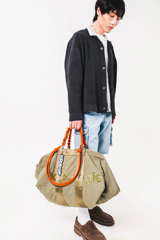 Canvas tote with braided O-rope strap, olive with orange rope handle and ring