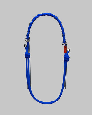 Blue braided O-rope bag strap with metal rings and adjustable cord ends