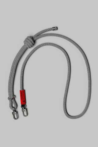 Monochrome lattice rope strap with metal clips and adjustable buckle