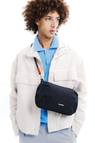 Topologie large black bottle satchel bag with front zipper pocket and adjustable strap
