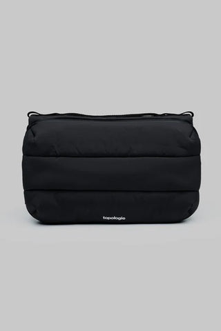 Topologie large black bottle satchel bag with curved top zipper and front logo