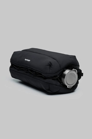 Topologie large black bottle satchel bag holding a water bottle, side cinch strap