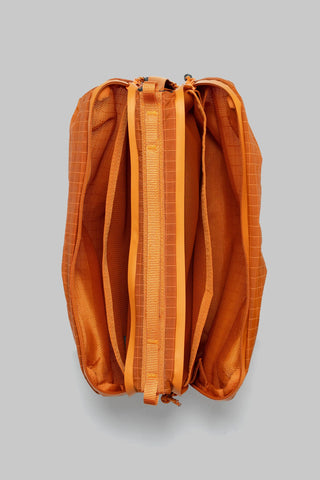 Burnt orange ripstop bottle sacoche open interior view with zipper and fabric panels