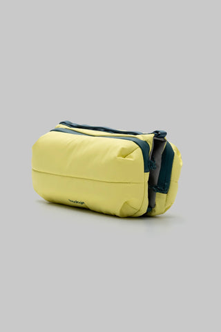 Canary yellow medium bottle sling bag with adjustable shoulder strap and side zip