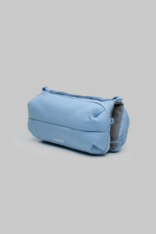 Topologie bottle sacoche medium light blue padded crossbody bag with zipper and side loop