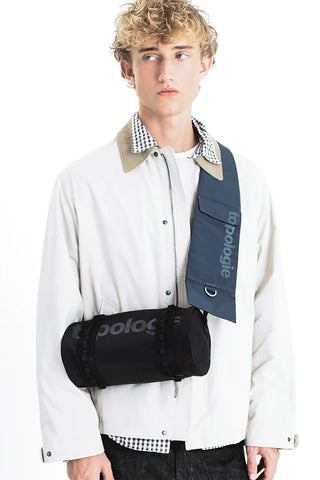 Topologie crossbody bag with black strap and front pocket, logo detail