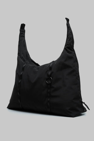 Medium black hobo bag with curved sides, front ruching, round D-ring, drawstring pull