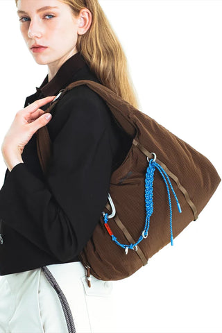 Topologie Cloud Hobo bag small in brown with blue beaded strap and side ring closure