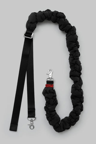 Braided dark strap with metal clips and adjustable belt ends