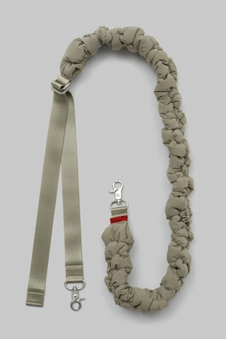 Topologie cloud strap in moss green with metal clips and adjustable fabric ends