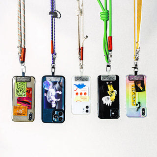 Assorted phone cases with attached phone strap adapters and hanging straps
