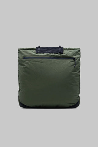 Deep green nylon helmet bag back view with horizontal zip pocket and dark bottom