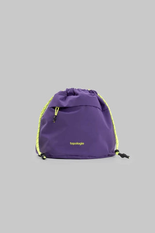 Reversible bucket bag in purple tech sateen with drawstring, cords, and topologie logo.