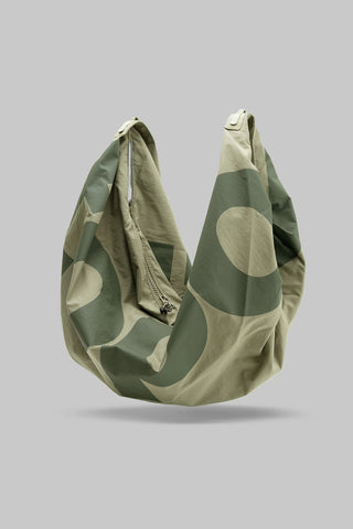 Moss-washed nylon hobo bag with wide loop handle and patterned front panel