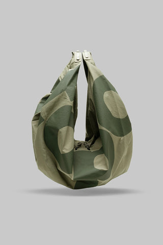 Washed moss nylon hobo bag with patterned panels and gathered top strap closure