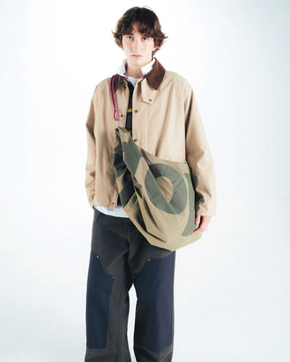 Topologie Robo bag worn across chest, moss green nylon with large beige circle print