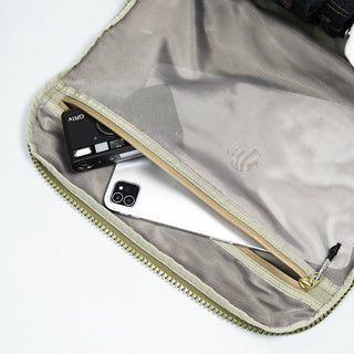 Olive duffle bag interior pocket with zipper and phone card slots