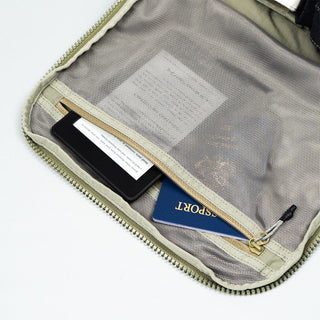 Open duffle bag interior pocket with cards and mesh zip divider