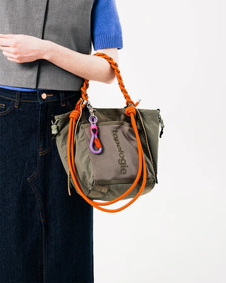 Small tote bag in olive green with orange rope handles and front logo panel